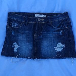 Distressed denim jean mini skirt